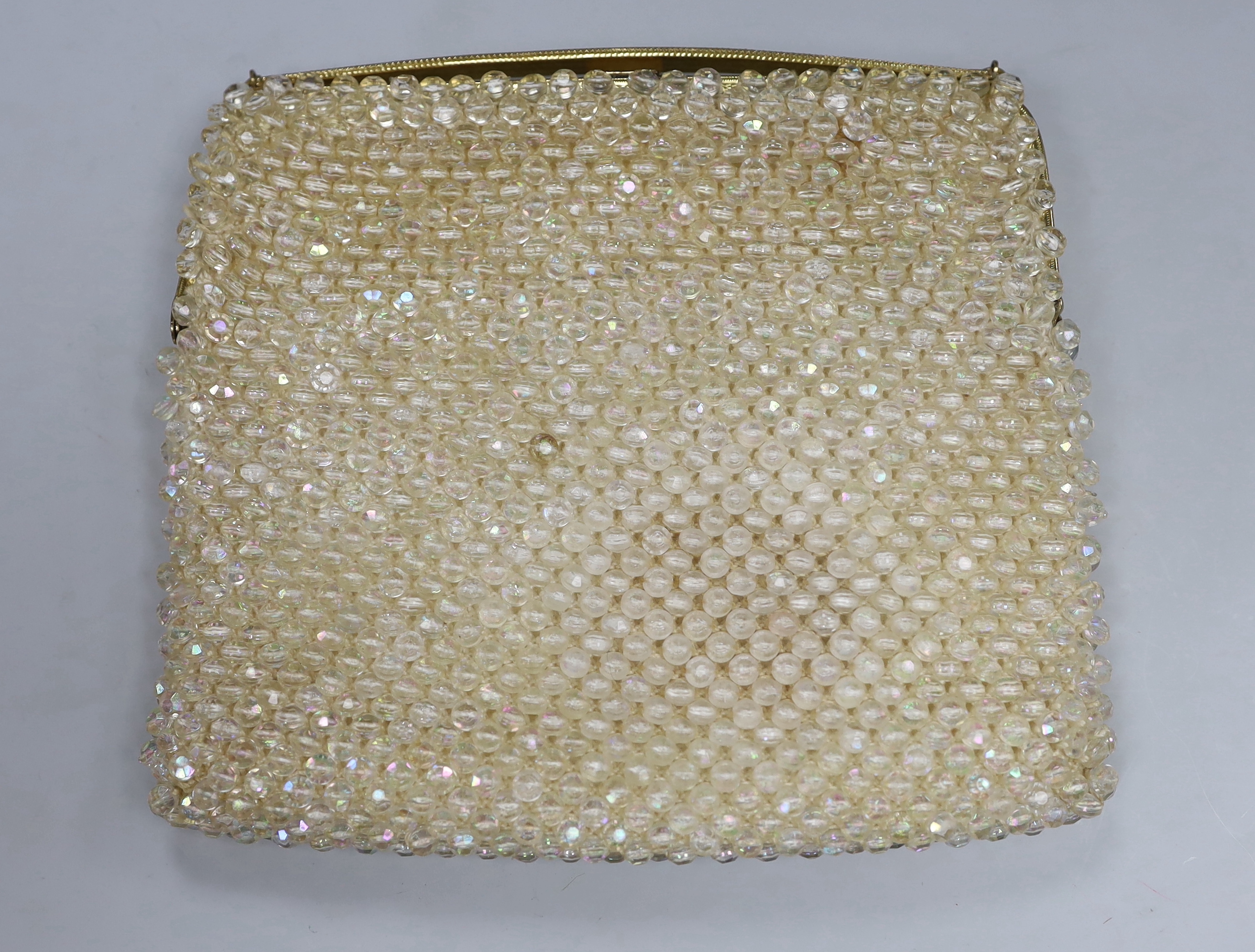 An evening purse, a shawl and pair of blue gloves